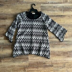 Beautiful Brittany Black shimmery women’s blouse size medium